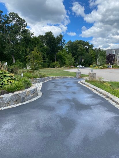 Shrewsbury MA driveway looking good after a fresh asphalt coating