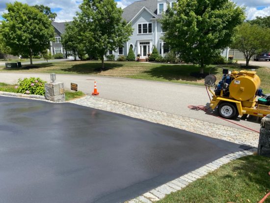 Shrewsbury MA driveway looking good after a fresh asphalt coating