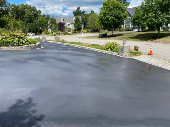 Shrewsbury MA driveway looking good after a fresh asphalt coating