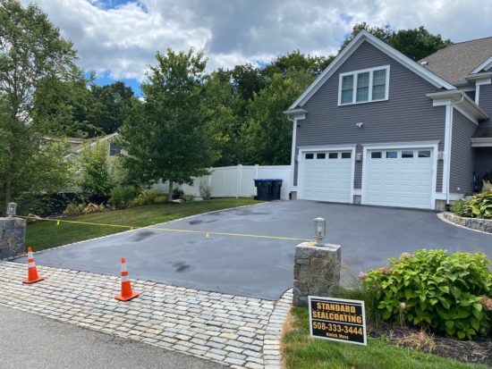 Shrewsbury MA driveway looking good after a fresh asphalt coating