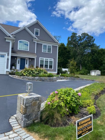 Shrewsbury MA driveway looking good after a fresh asphalt coating