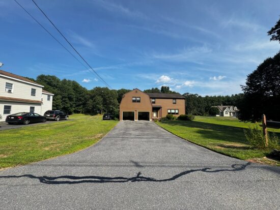 Comprehensive Cleaning, Crack Filling, and Sealcoating of an Asphalt Driveway in West Boylston, MA