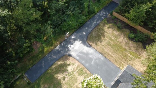 Sealcoating Two-Year-Old Driveway, Norfolk, MA