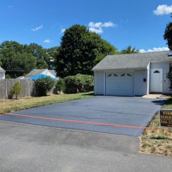 Crack Filling and Sealcoating Driveway in Charlton Massachusetts