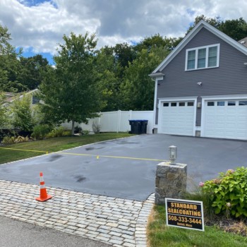 Shrewsbury MA driveway looking good after a fresh asphalt coating